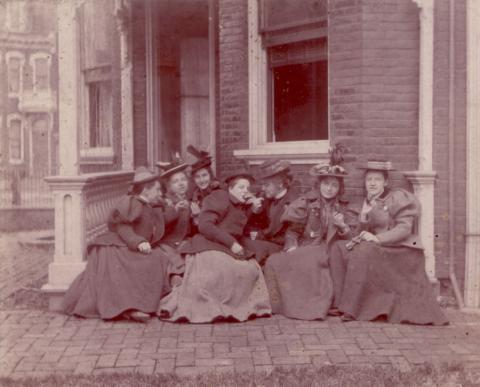 Female Dickinsonians Enjoy a Snack on the Porch of Lloyd Hall, 1902
