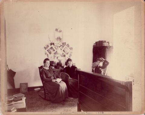 Photograph of Early Female Students Relaxing in a "Dorm" Room